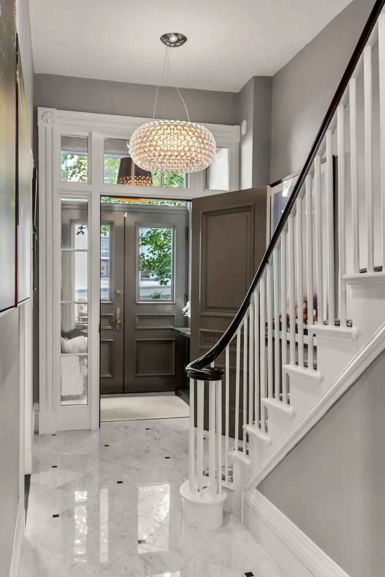 Entry foyer with curved staircase