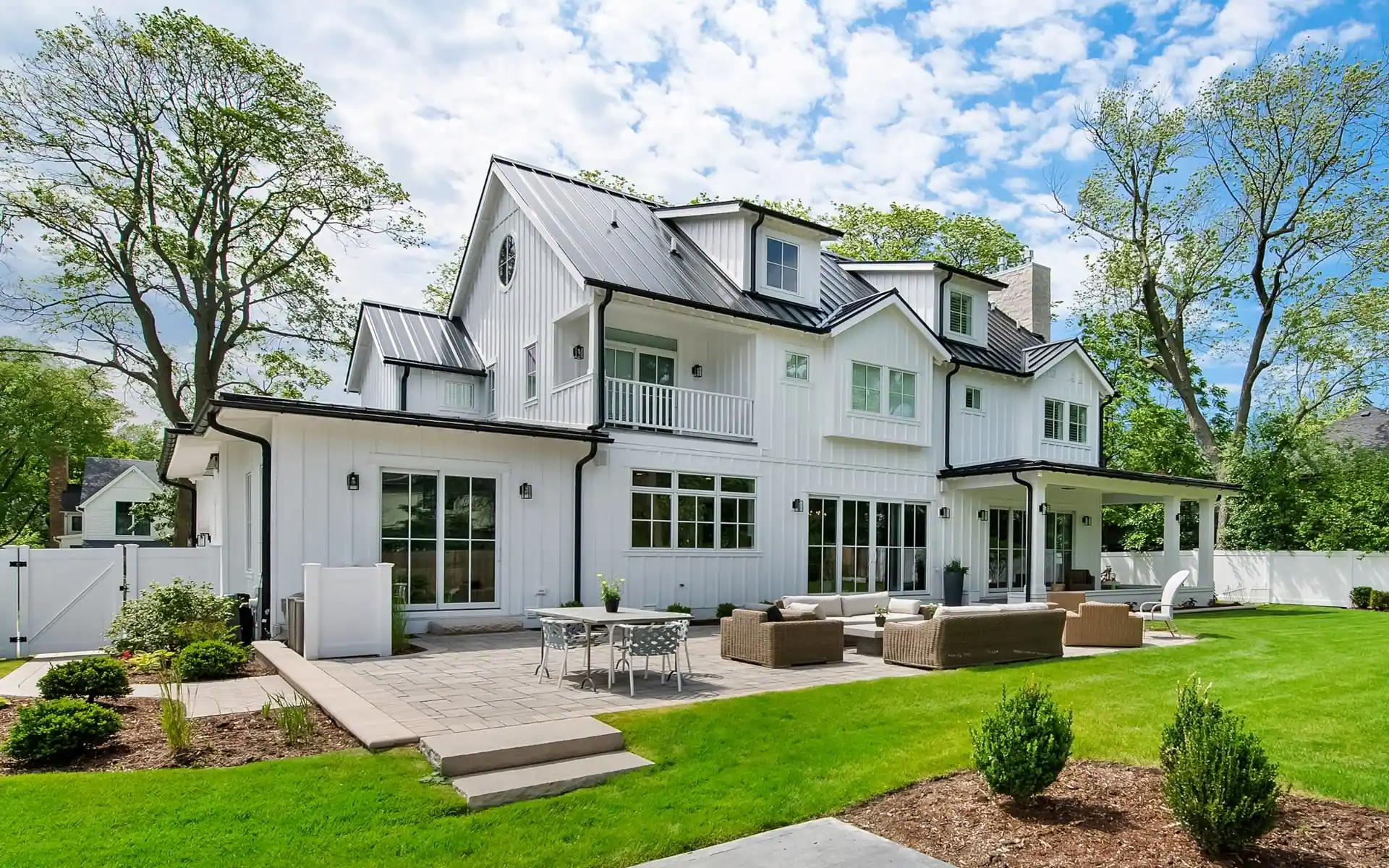 White modern farmhouse with patio